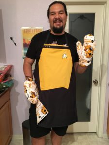 An apron in the style of a Star Trek The Next Generation engineering uniform